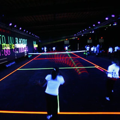 Twenty-eight UV lamps illuminated the indoor tennis court, which was delineated with reflective UV tape.