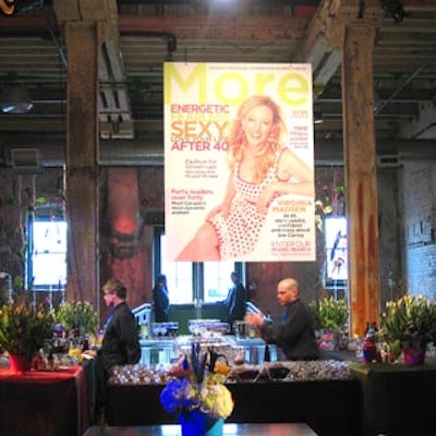 A large poster of the premier magazine cover hung from the ceiling.