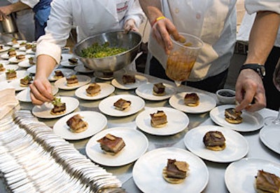 To keep the lines moving, the chefs plated dozens of dishes at once, like Ilan Hall’s crispy lamb.