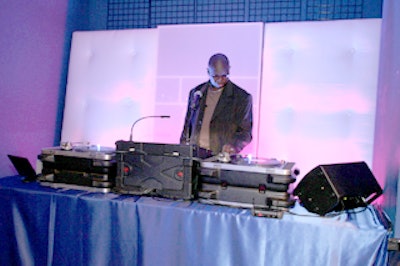 DJ Eric Visa spins tunes at the Event Style Awards.
