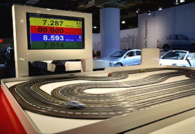 Volkswagen’s area had fun activities, including interactive computer stations and a model race track inviting showgoers to linger and play.