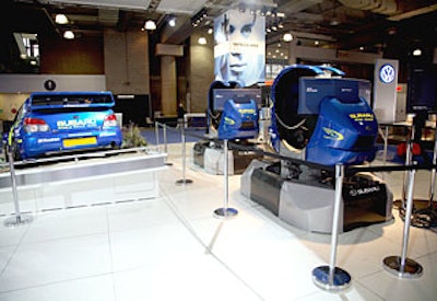 Subaru had Gran Turismo driving simulators at the edge of its display that proved popular with adults, kids, and even journalists.