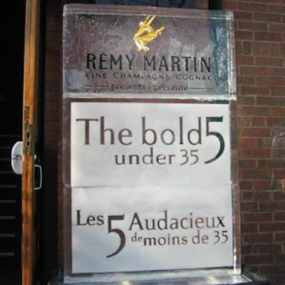 Outside the venue, a tall, rectangular ice sculpture bore the name Rémy Martin, with 'The Bold 5 Under 35' appearing below in both French and English.