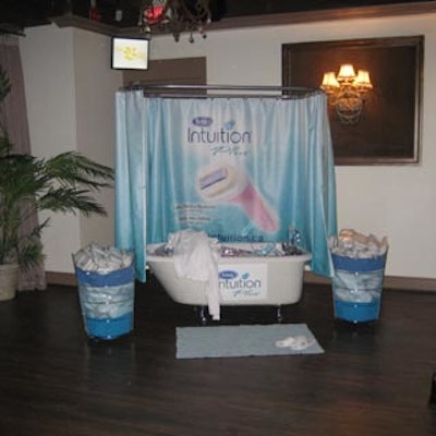Schick Intuition Plus used a claw foot bathtub and collapsible barrels to create a bathroom vignette that served as display for the company's disposable razors.