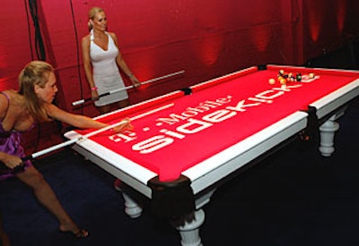 The T-Mobile Sidekick iD logo decorated pool tables.