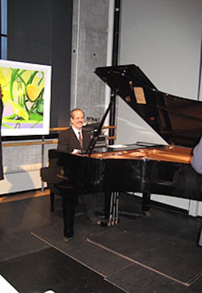 Advisory board member Lenny Babbish volunteered to play the studio’s piano throughout the evening.