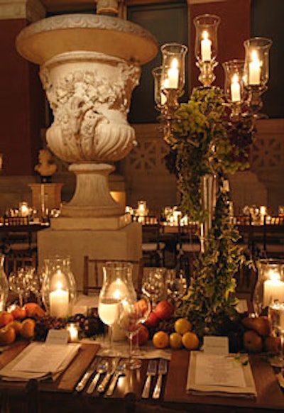 Reminiscent of lavish Roman feasts, Bulgari decorated the tabletops with fruit (including blood oranges, Bosc pears, and plums), hurricane lamps, and simple terra-cotta tiles (in place of traditional chargers).