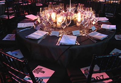 Calvin Klein Home provided the tabletop decor, which included short arrangements of succulents, plain linens, and low votives. The pearl motif continued in the evening’s program, which featured circular shapes throughout.