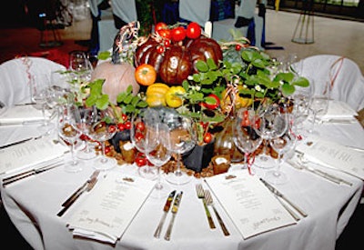 Author Abbie Zabar created a harvest table with bronze casts of farmer Amy Goldman’s heirloom pumpkins, gourds, and squash. Doubling as placecards, Zabar’s calligraphed dinner menus topped each guest’s place setting.