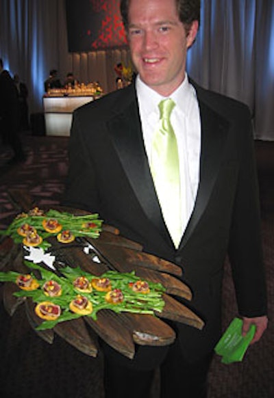 Leaf-shaped wooden palettes represented the new AOL program iLand, and caterwaiters wore matching pale-hued ties.