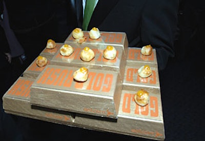 Stacks of gold bars (representing Mark Burnett’s game show Gold Rush) featured miniature brie en croute with apricot chutney.