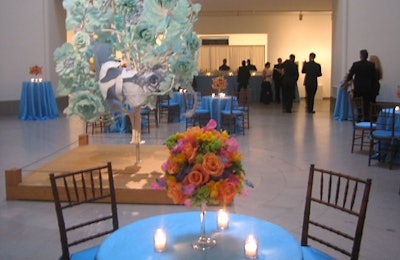 In the Cantor Gallery, lush floral centerpieces from Sunnyside Flower Shop echoed artist Joanne Carson’s light blue floral sculpture, titled “Bouquet.”