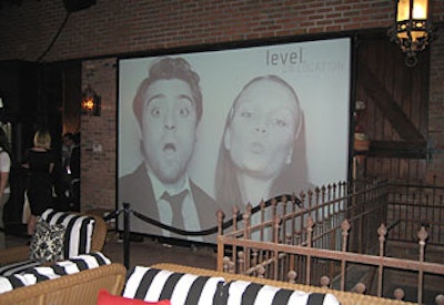 Mark Van S. Studios projected shots of guests in the digital photobooth onto a Level-branded screen near the V.I.P. lounge.
