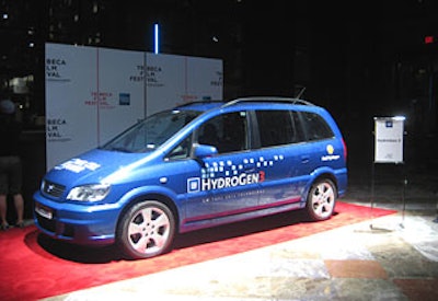 Sponsor GM displayed two green vehicles (the 2007 Saturn Aura Green Line Hybrid and the HydroGen3) at the perimeter of the room. Sponsor National Geographic hung large banners on the walls.