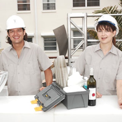 Hard hat-wearing bartenders used toolboxes that held cups and napkins.