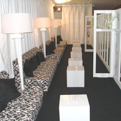 An intimate lounge designed by Nuage Designs pulled in the black-and-white theme.
