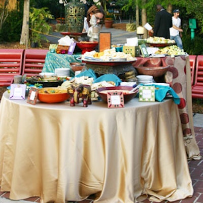 Hors d'oeuvres tables were covered in gold satin.