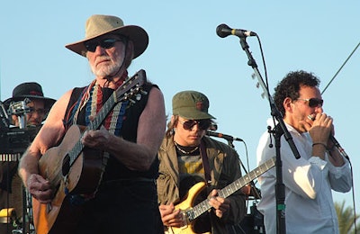 Willie Nelson and his band were among the acts in the multi-genre lineup.