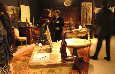 Guests browsed exhibitors’ goods during the Los Angeles Antiques Show opening night preview party.