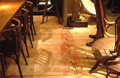 Venice, California-based antiques purveyor Obsolete used vintage planks as its booth floor.