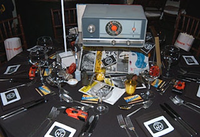 The display for the Office of Film, Theatre, and Broadcasting overflowed with Broadway programs, disposable cameras, and mini film reels.