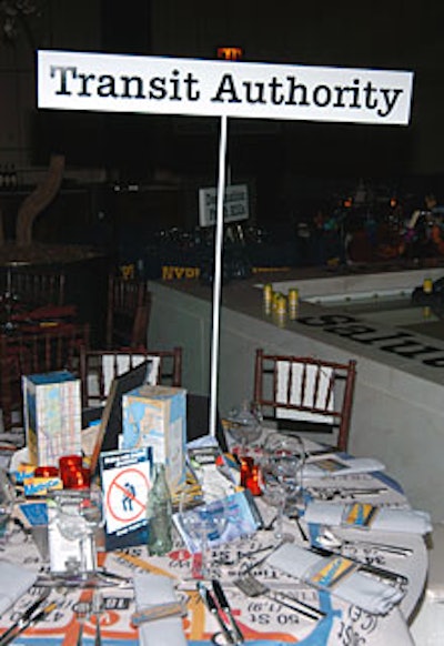Covering the Transit Authority’s table was a linen printed with the New York City subway map.