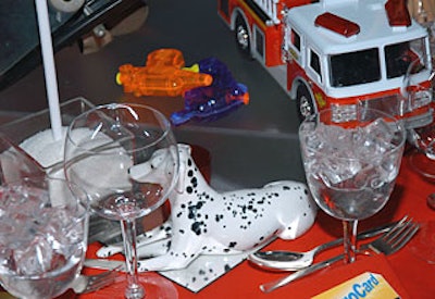 Fire hats, dalmatian figurines, fire trucks, and flags adorned the FDNY seating.