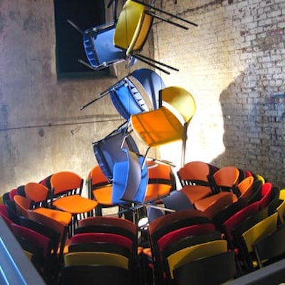 A collage of colourful Teknion office chairs sculpted by artist Bruno Billio adorned the entrance of the Distillery District's Fermenting Cellar for Teknion's launch of three new furniture lines.