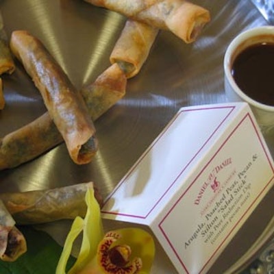 Daniel et Daniel also served spring rolls filled with arugula, poached pear, pecan, and stilton.