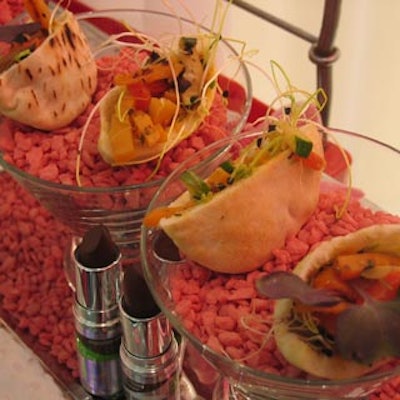 Appetizers included miniature grilled vegetable pitas in pebble filled martini glasses, served on long platters covered in more pink pebbles.