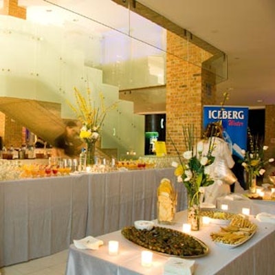 Urban Source Catering set up serving tables in the Hazelton Lanes rotunda.