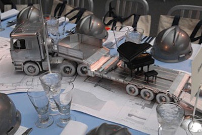 Beneath the tables’ centerpieces of miniature construction vehicles were copies of the blueprints for Alice Tully Hall’s renovations.