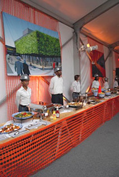 Draped throughout the dinner tent in Damrosch Park was orange netting that referenced the construction theme.