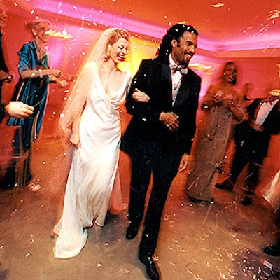Actors portraying whimsically named characters Polly Golightly and Eustace Tilley were married in a mock wedding for a party for The Perfect Wedding Reception.