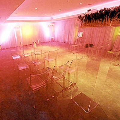 For the mock wedding ceremony, Maria McBride-Mellinger chose to bathe the Hudson Hotel's ultra-modern banquet room with lavender light and used clear Lucite columns from Industrial Plastics to underscore the hotel's minimalist look.