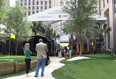 Behind the main attraction—the 17th-hole challenge—sat putting greens with real palm trees, flowers, and grass.