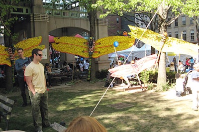 At the Family Festival street fair, Delta Airlines sponsored a kite-making area where children could craft their own high-flying toys.