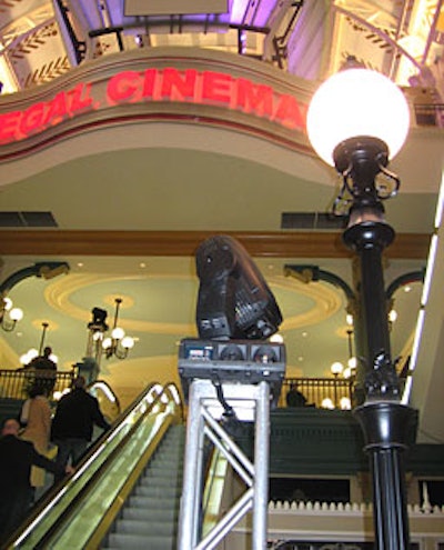 Rotating keg lights cast spotlights on the wallsand ceiling of the Regal Cinema at Gallery Place.