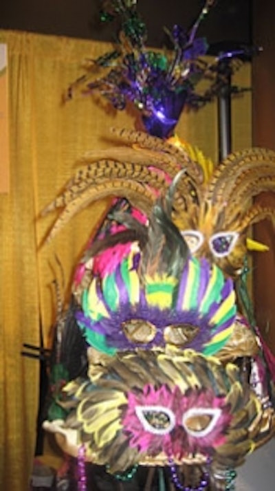 Enchanted Florist supplied feathery masks to enhance the Mardi Grastheme.