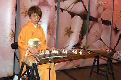 During dinner, a kimono-clad musician from the Washington Toho Koto Society played the stringed koto, a 17th-century Japanese instrument with origins in China.