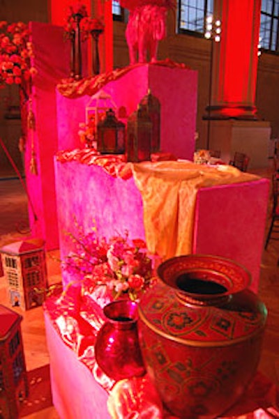 Brightly colored partitions decorated with propsfrom the production separated the cocktail hour from the dinner reception.