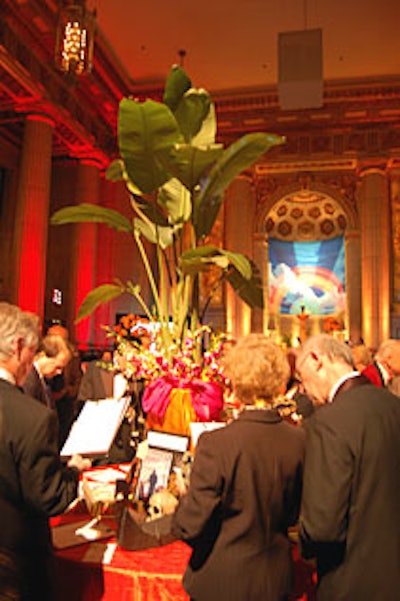 A potted banana tree crowned the silent-auction table.
