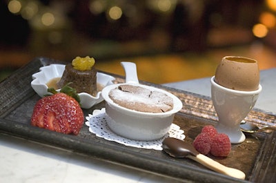 Occasions Caterers served a selection of three mini Irish desserts, including Baileys Irish cream custard served in a brown egg, sticky toffee pudding with butterscotch sauce, and warm Irish whiskey and chocolate fondants.