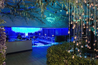The raised garden tent offered views into the blue-hued living room tent.