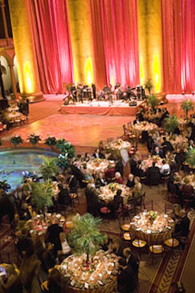 Held in the National Building Museum, the spring gala featured a Latin theme, complete with palm-accented centerpieces and bright draping.