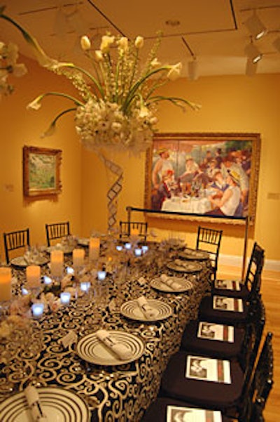 Pierre-Auguste Renoir's 'Luncheon of the Boating Party' was the backdrop for the long table in the main gallery.