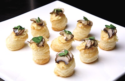 Their mushroom tarts are topped with parsnip puree, sliced mushrooms, porcini oil, and a few pea shoots.
