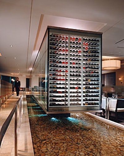 The glass-enclosed wine cube at Charlie PalmerSteak.