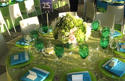 Swatches curved around the base of the floral centerpieces that decorated the smaller, round tables.