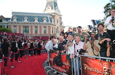 Hordes of press reps and fans flanked the red carpet, which snaked through the theme park.